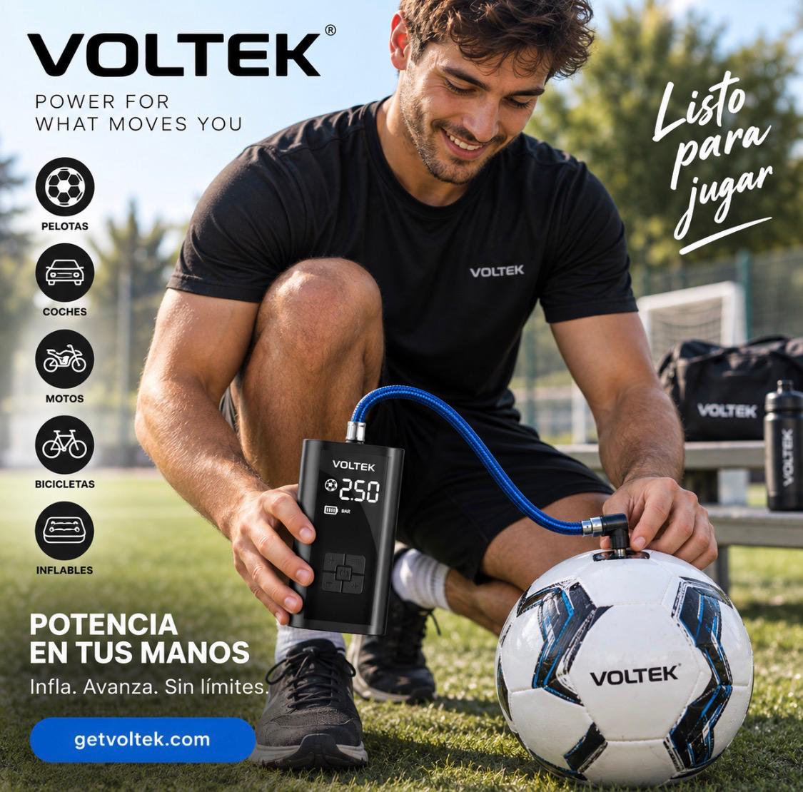 Man using the Voltek portable device to inflate a football outdoors